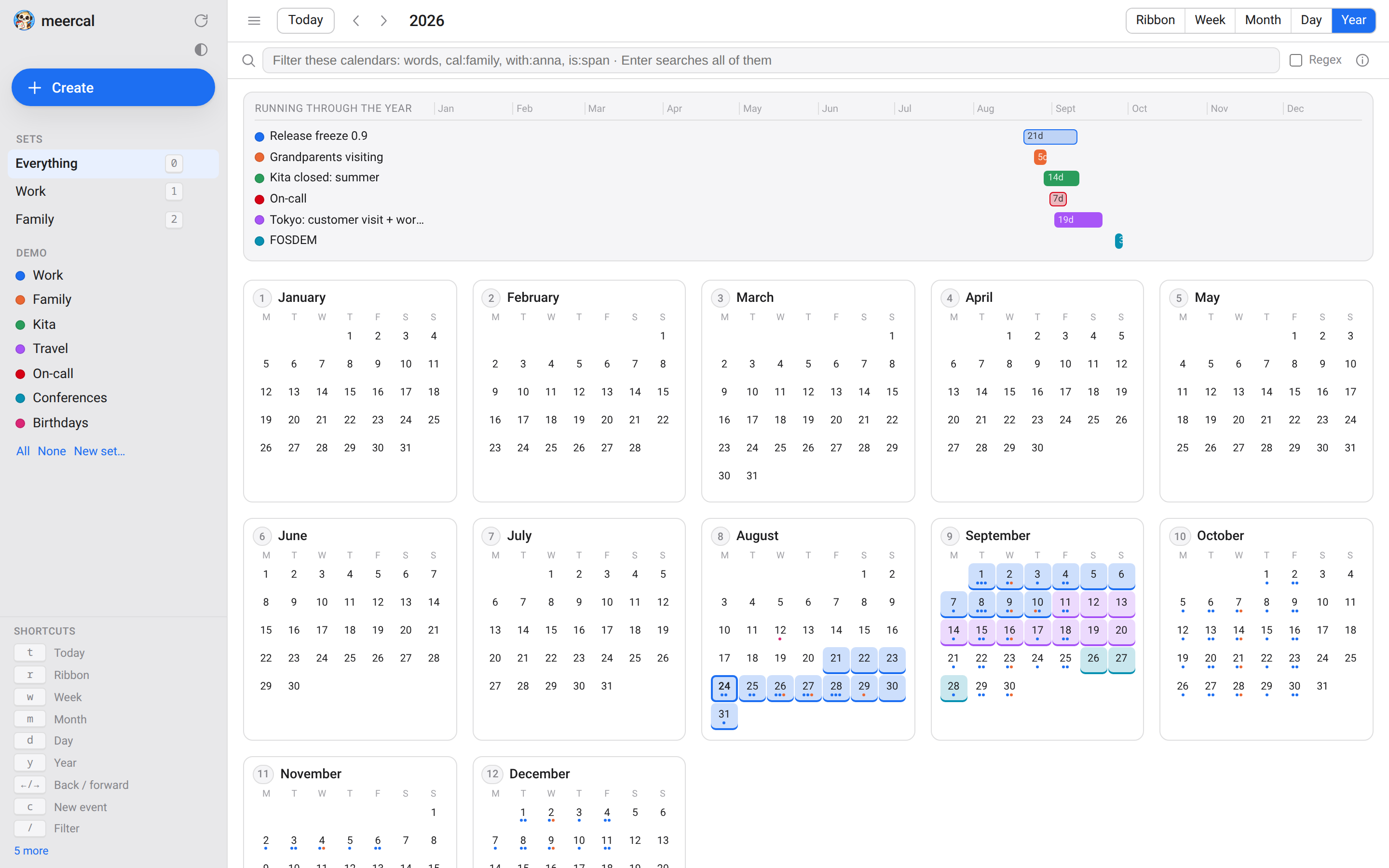 The meercal year view: a band of horizontal bars for the year's long events above twelve mini-month grids with tinted days.